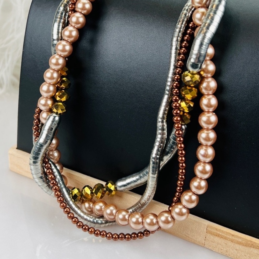 Beautiful, multi tone and texture costume necklace